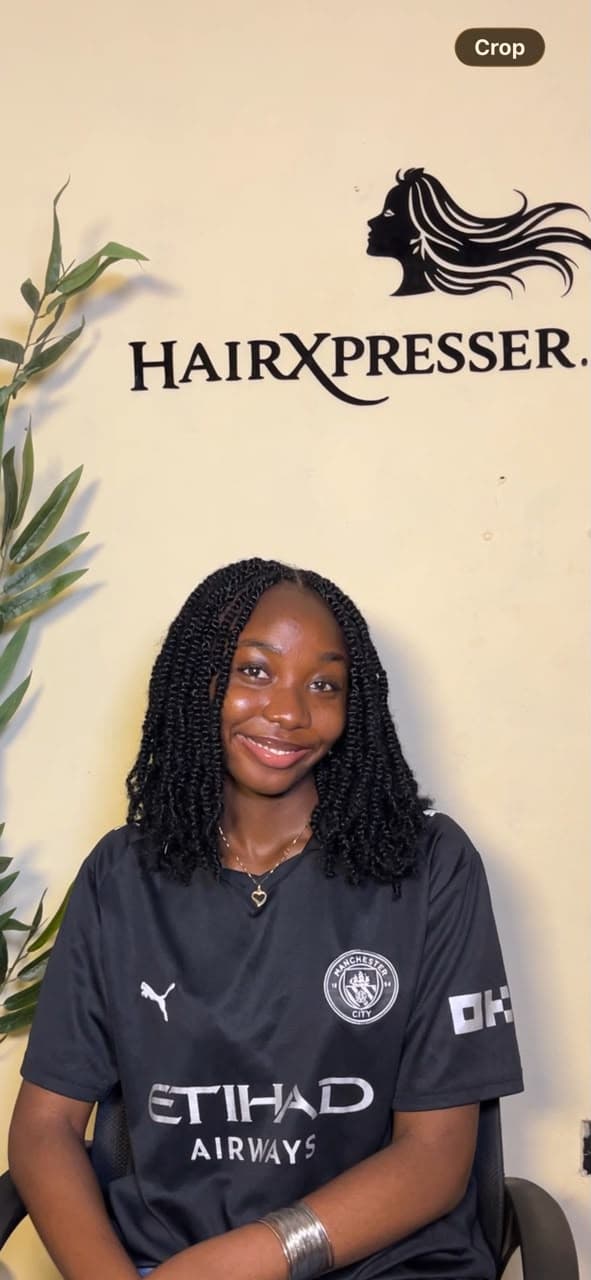 Client with kinky twists hairstyle — front view at Hairxpresser.NG