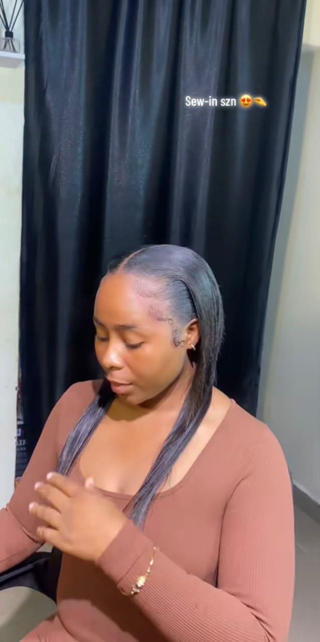 Client with sleek straight sew-in hairstyle at Hairxpresser.NG