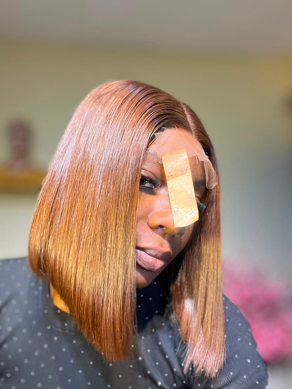 Honey blonde straight bob lace-front wig — side view