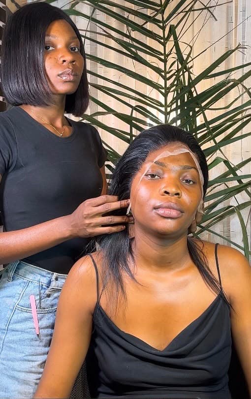 Client with lace front wig installation at Hairxpresser.NG salon